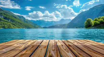 Foto op Canvas Table en bois, arrière-plan sur fond flou de lac et de montagnes, image avec espace pour texte. © David Giraud