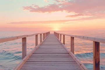 Fototapeten Wooden Pier Extending Into Ocean at Sunset © BrandwayArt