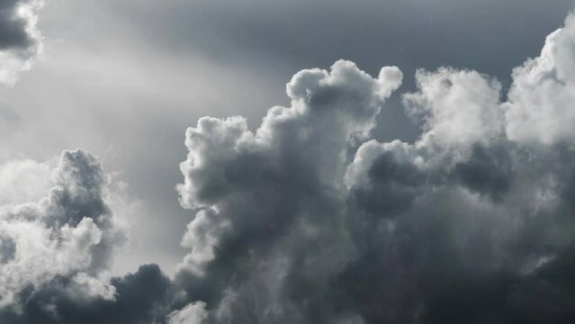 Dark Clouds Close-up.
Telephoto shot of cumulus clouds speeded-up a little.