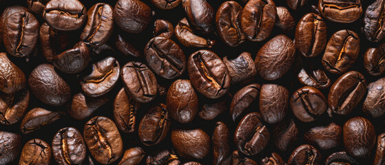Roasted coffee beans texture for background. Roasted coffee beans for background or design, top view. - obrazy, fototapety, plakaty