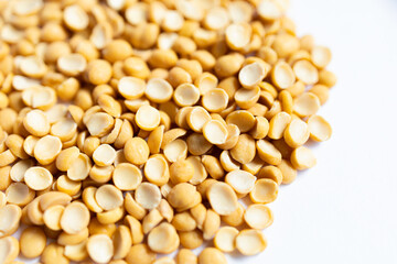 Yellow split peas on white background