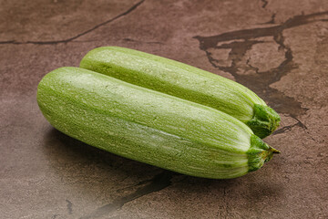 Raw green ripe zucchini vegetable