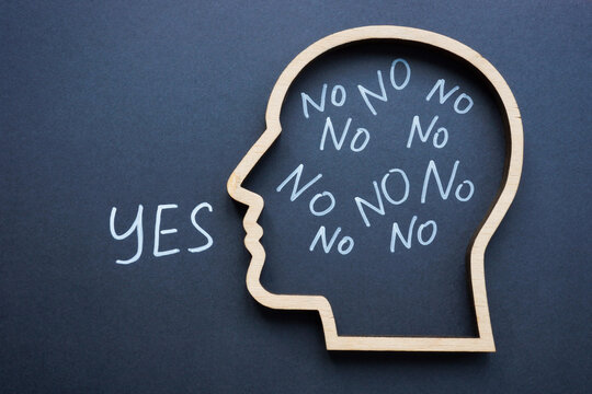 Learn to say no concept. Outline of a head with the word yes.