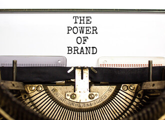 The power of brand symbol. Concept words The power of brand typed on beautiful old retro typewriter. Beautiful white background. Business the power of brand concept. Copy space.