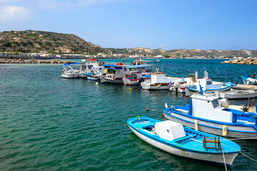 Fototapeta na wymiar Colorful fishing boats moored in the port of Kefalos on the island of Kos. Greece