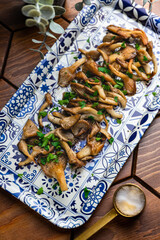 Fried oyster mushrooms on a plate - 773369966