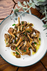 Fried oyster mushrooms on a plate - 773369984