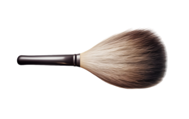 A close-up view of a brush bristles against a white background