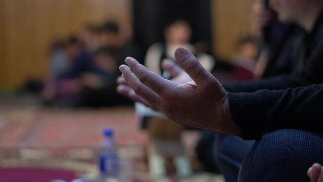 A Muslim man prays in a mosque during Ramadan