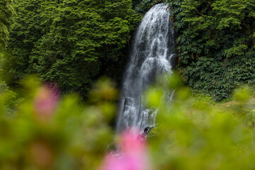 Naklejka premium Veu da Noiva (Brides Veil) waterfall in Ribeira dos Caldeiroes, Nordeste, Sao Miguel island, Azores, Portugal