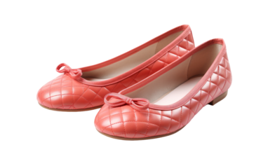 A pair of vibrant pink shoes with delicate bows sitting side by side