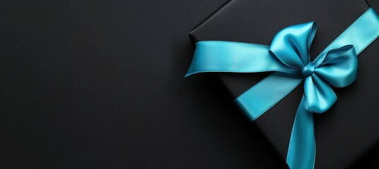 Black background with a blue ribbon and gift box.