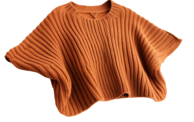 An orange sweater sways gently on a clothes line in a whimsical display