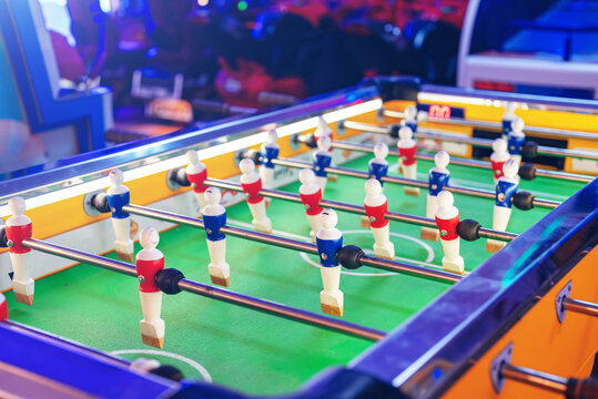 Table football game with red and blue players