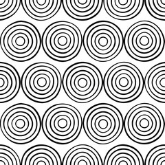 Fototapeta na wymiar Seamless pattern with black circles