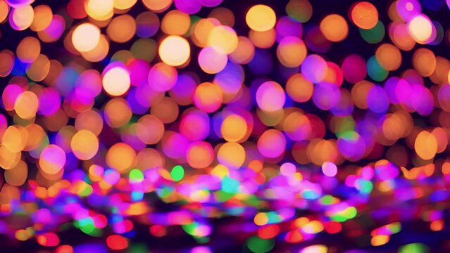 Multi-colored circle particles in flat style flying through the camera. light ray glowing shimmer radiance. Digital Art. Computer animation. Modern background. motion design. Loopable.LED 4K bokeh 