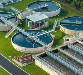 Aerial view of water treatment factory at city wastewater cleaning facility. Purification process...