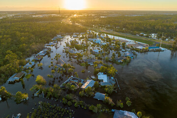 Aftermath of natural disaster. Surrounded by hurricane Ian rainfall flood waters homes in Florida...