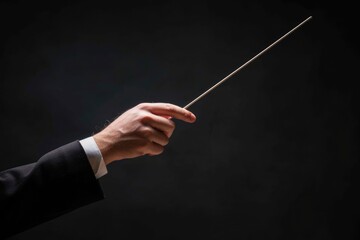 Conductor Music: Hands of Conductor with Baton Leading Symphony Orchestra in Isolated Setting