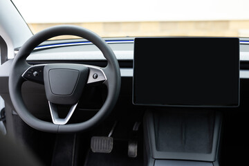 Empty cockpit electric vehicle, Head Up Display and digital speedometer. Steering wheel of electric...