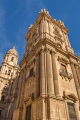 Málaga Cathedral (Catedral de la Encarnación de Málaga), catholic church with beautiful blue sky without people, south Spain, Europe