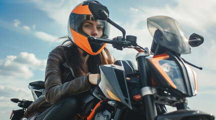 Fototapeta na wymiar A woman in a motorcycle helmet leaning confidently against a sleek black and orange motorcycle, capturing the essence of freedom and adventure