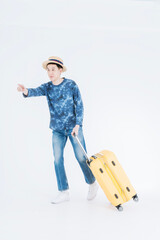Young traveler with luggage on white background. Young man with suitcase isolated on white.