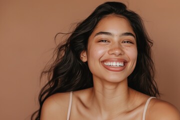 Portrait of beautiful smiling young indian woman with perfect white teeth