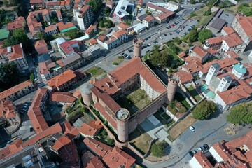 aerial view of the center of the city of Ivrea with The Castle of Ivrea also known as "Castle of the Red Towers" in the center. Ivrea, Turin, Italy