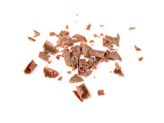 Many crushed chocolate shavings isolated on white