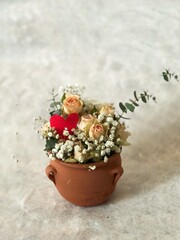 Bouquet of summer flowers in a ceramic vase