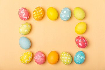 Easter eggs on a bright background. Easter celebration concept. Colorful easter handmade decorated Easter eggs. Place for text. Copy space.