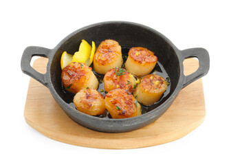 Delicious fried scallops in pan isolated on white