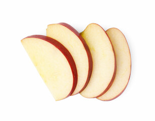 Slices of ripe red apple isolated on white, top view