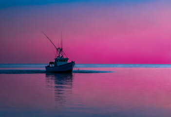 Fishing boat on sea in morning. Food industry