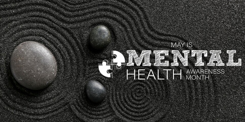 Zen stones in Japanese rock garden, top view. Banner for Mental Health Awareness Month