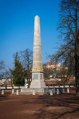 Stone column obelisk on the square in the park in the center of Brno, Czech Republic.