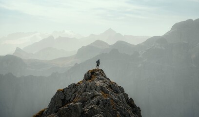 person on the top of the mountain