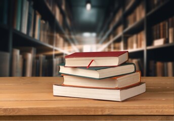 Book stack on the desk in public library