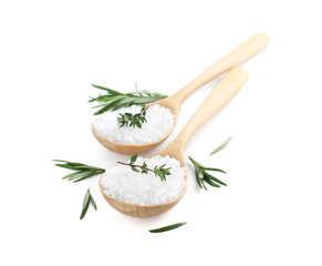 Salt with herbs in spoons isolated on white