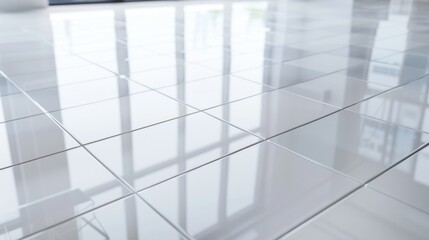 A simple white tiled floor with a window in the background. Suitable for interior design concepts