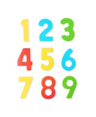 Colorful numbers on white background, top view