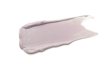 Stroke of purple color correcting concealer on white background, top view