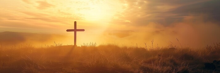 Golden sunrise behind a hilltop cross - The sun casts a golden glow behind a hilltop cross, symbolizing hope and a new beginning in a panoramic landscape