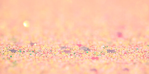 Pink and beige background with thin focal part and defocus lights. Abstract background.