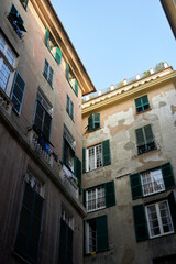 Fototapeta na wymiar view on a facade with balconies in Genova, Italy