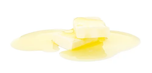 Schilderijen op glas Pieces of melting butter isolated on white © New Africa