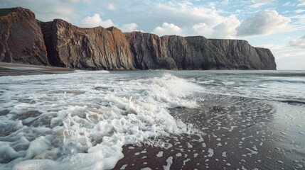 Powerful waves crashing onto sandy beach, ideal for travel brochures