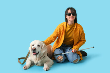 Blind woman with guide dog on blue background