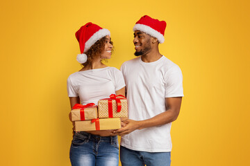 Millennial african-american couple ready for Christmas holidays